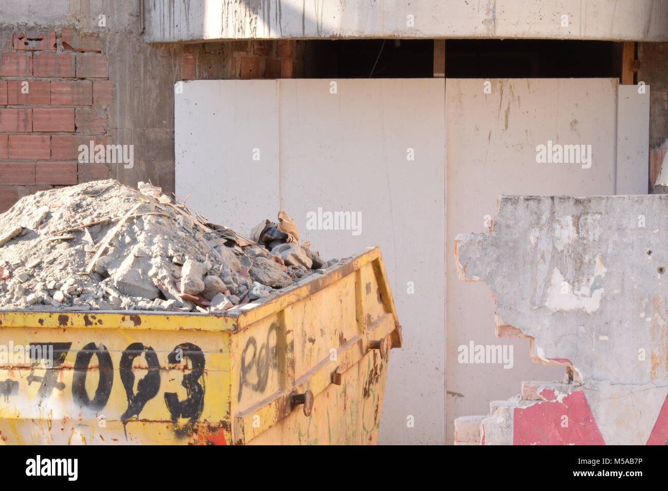 bucket-with-construction-debris-M5AB7P